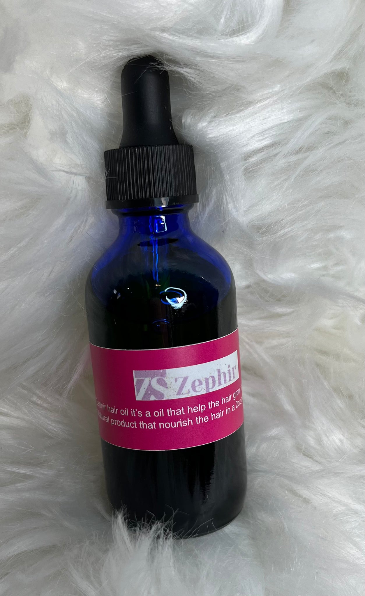 ZS Oil Is A OilThat Help The Hair Grow And Moisture Your Scalp.